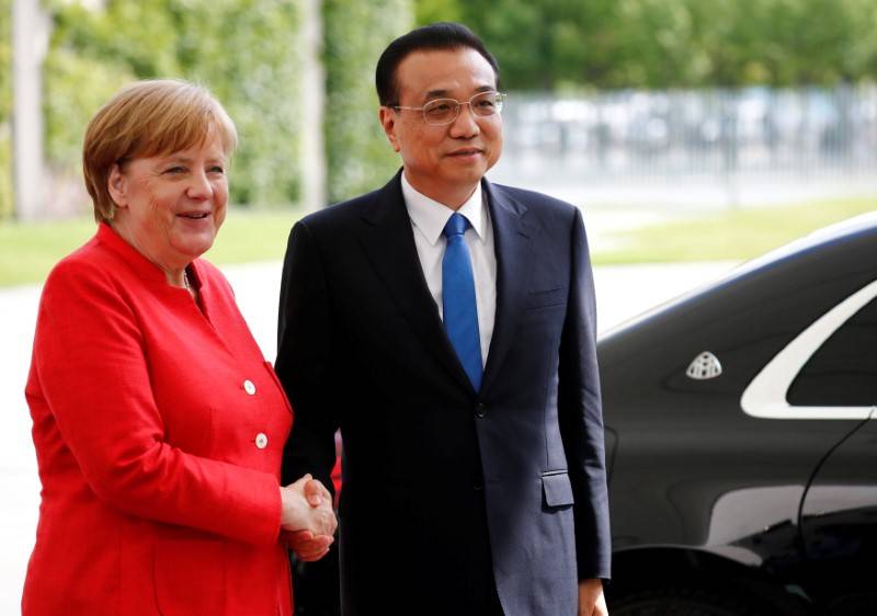 With raft of deals, China and Germany swear to keep trade free