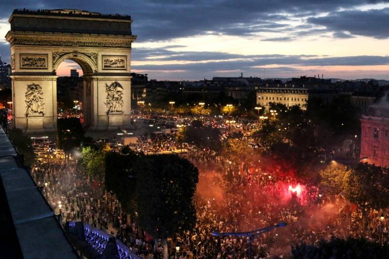 France reach World Cup final as Paris erupts
