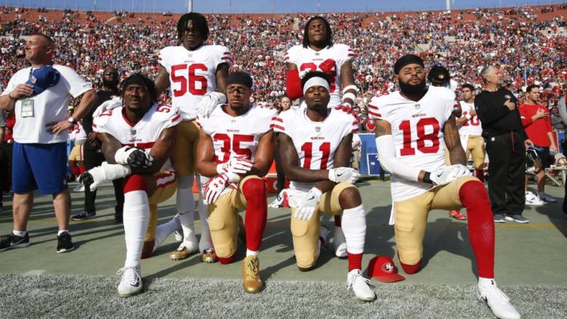 Donald Trump wants NFL players banned for season if they kneel during anthem