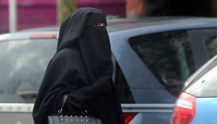 Swiss vote on regional 'burqa ban', GMOs