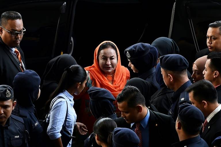 Wife of ex-Malaysian leader charged with money laundering