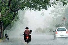 Scattered rain break heat spell in Lahore