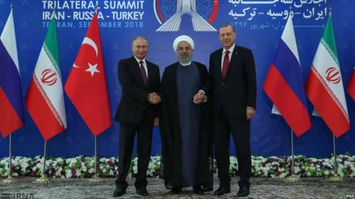 Russia, Turkey agree to scale down tensions in Idlib as Iran's president proposes trilateral Tehran summit over Syria