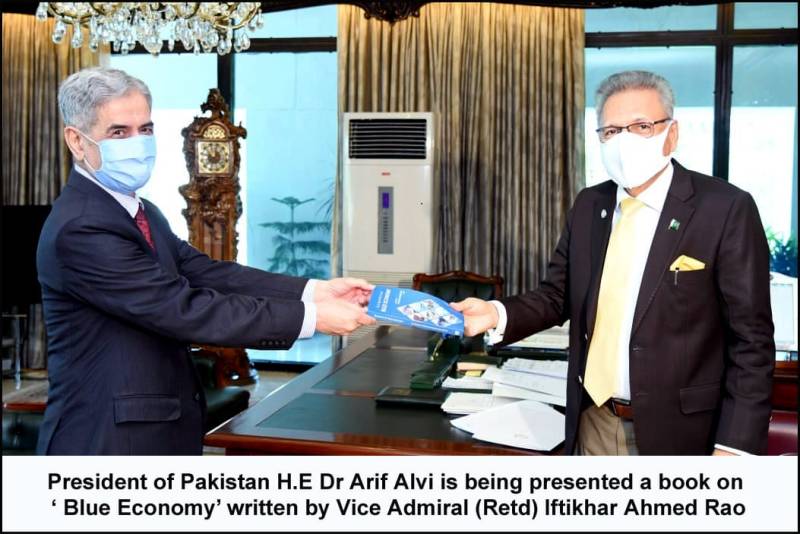 President Arif Alvi presented with book on ‘blue economy’ written by vice Admiral (R) Iftikhar Ahmed Rao