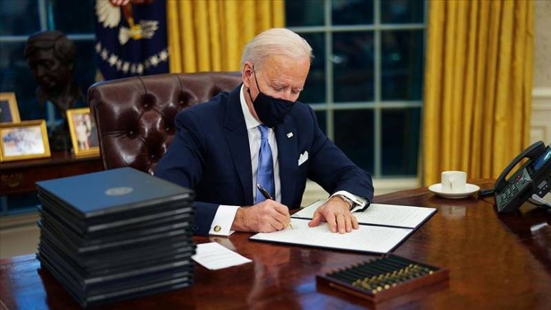 Biden signs 17 orders in sweeping erasure of Trump acts