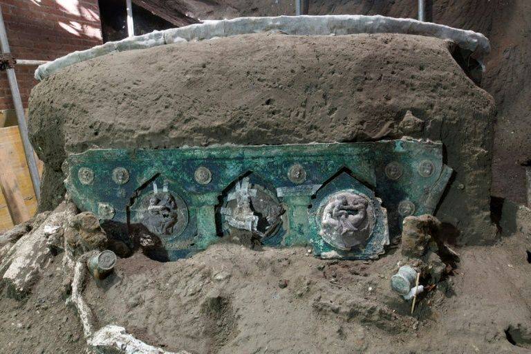 Archaeologists discover four-wheeled chariot in ancient city of Pompeii
