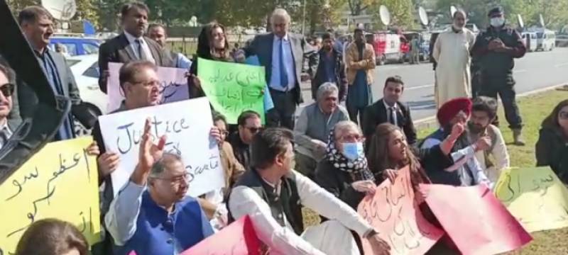 PTI senators stage token sit-in outside Parliament