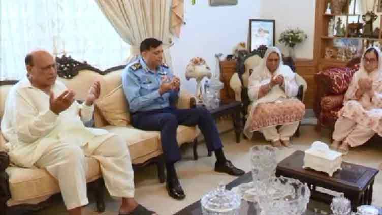 PAF chief visits residence of martyred PAF officer
