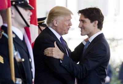 In jab at Trump, Trudeau cites need to face climate change facts