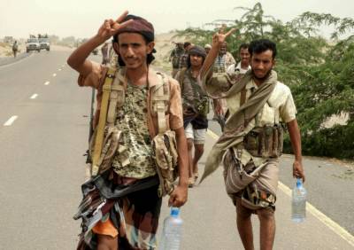 Yemen rebel leader defiant as dozens die in battle for key port