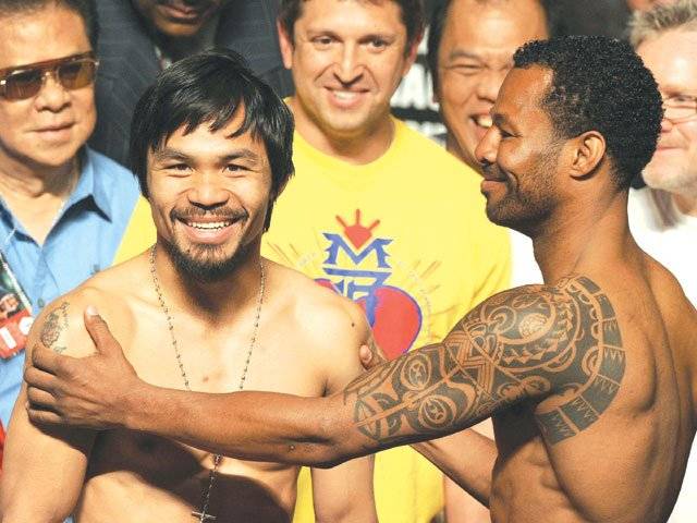 Pacquiao, Mosley weigh in for title bout