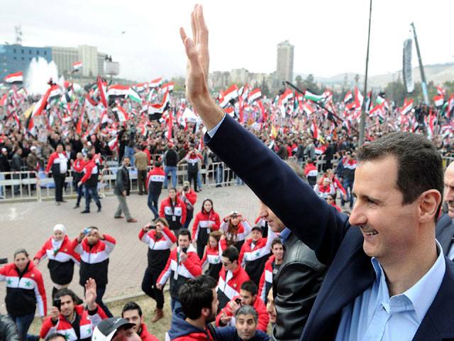 Assad vows victory, Syria accused of war crimes