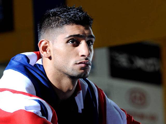 Amir Khan in toughest training for title rematch