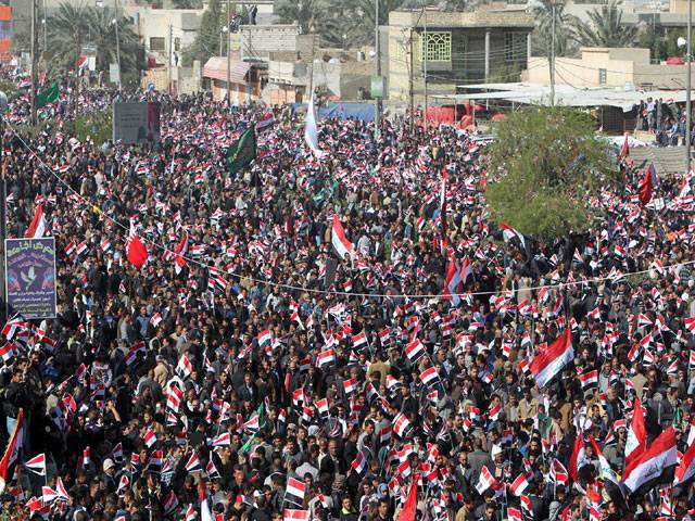 Tens of thousands flood streets for south Iraq demo