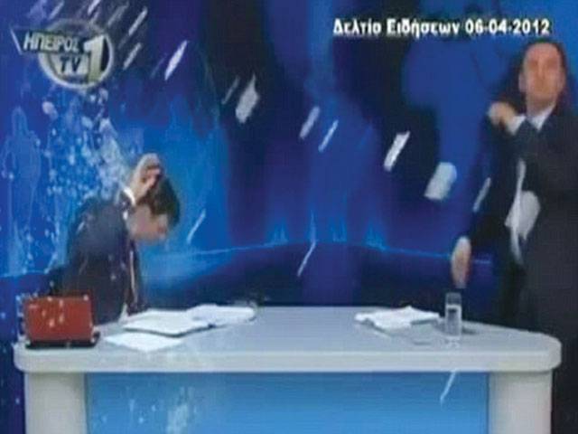 Newsreader pelted with eggs and yoghurt