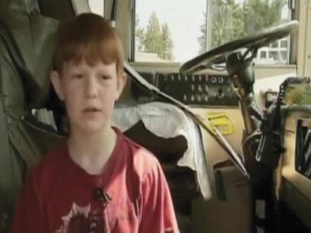 Boy steers school bus to safety