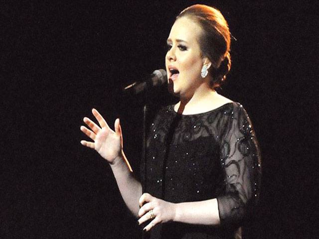 Adele retains UK albums No 1 with ‘21’