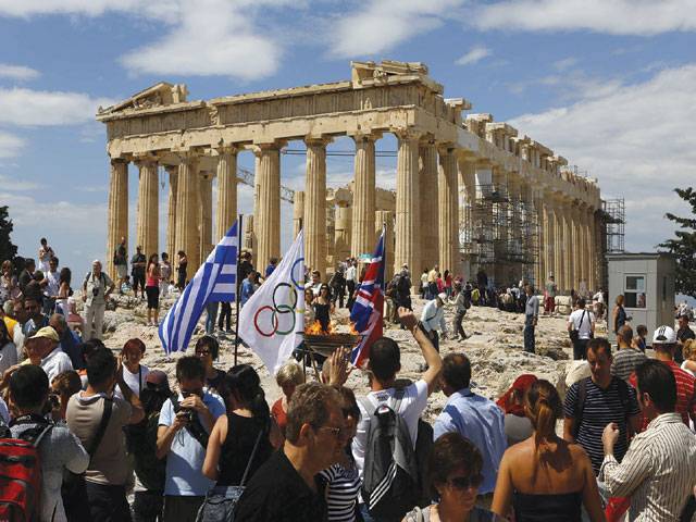 Greece prepares to hand Olympics flame to London