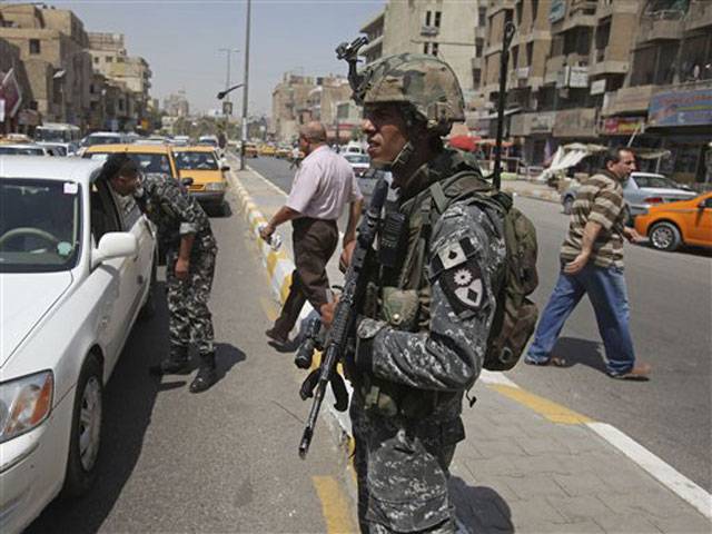 9 killed in Iraq checkpoint attacks
