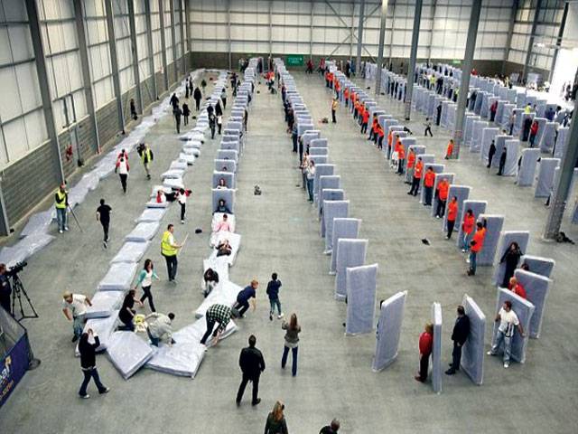 Human dominoes smash Guinness world record