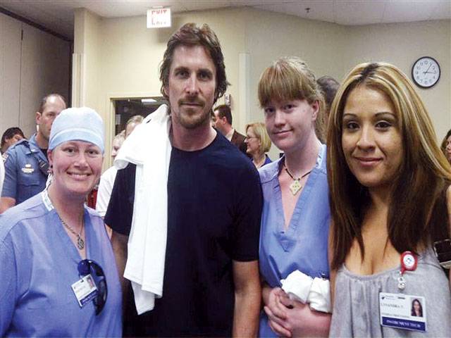 Christian Bale visits US shooting victims