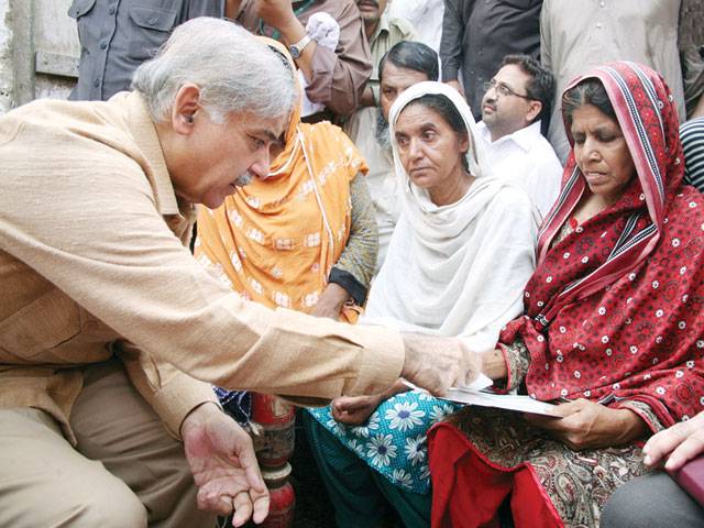 CM tries to heal victims' wounds 