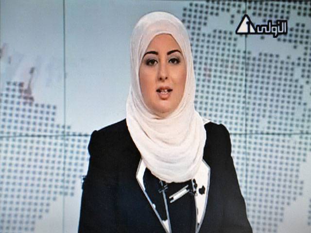 Egypt’s first veiled news anchor