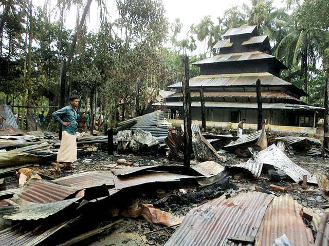Rioters torch Buddhist temples in Bangladesh