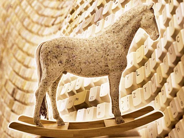 Horse sculpture made out of 18,000 computer keys
