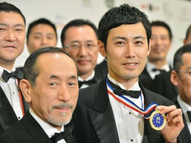 Japanese maitre d' wins world cup for waiters 