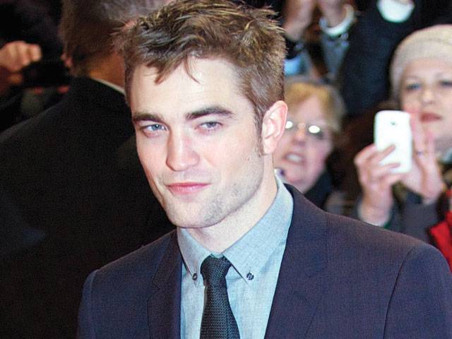 R-Pattinson looks for danger after Twilight