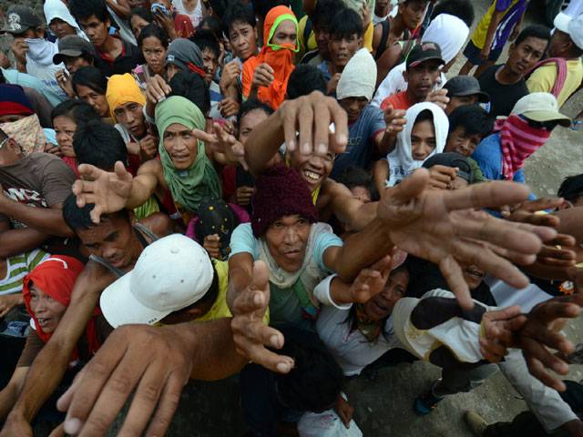 Typhoon reduces Philippine farmers to beggars