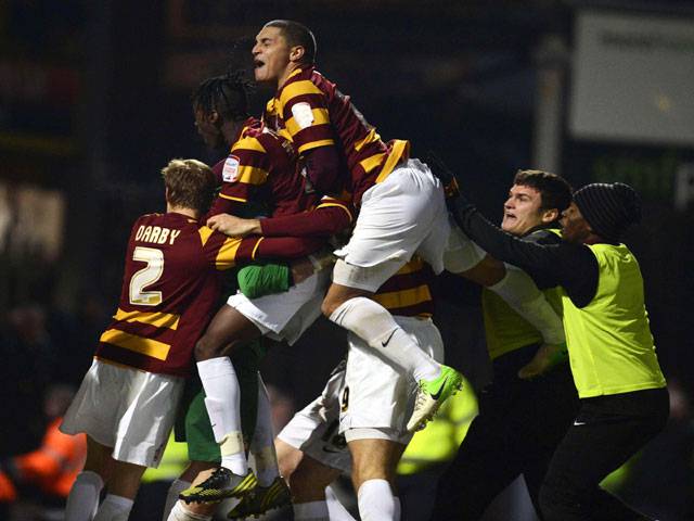 Arsenal stunned as Bradford win League Cup shoot-out