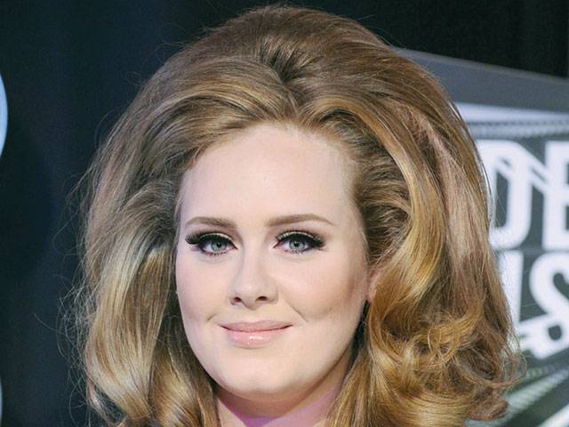 Adele rules iTunes chart again 