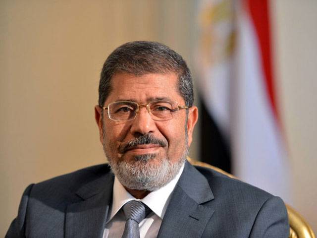  Mursi signs disputed constitution into law