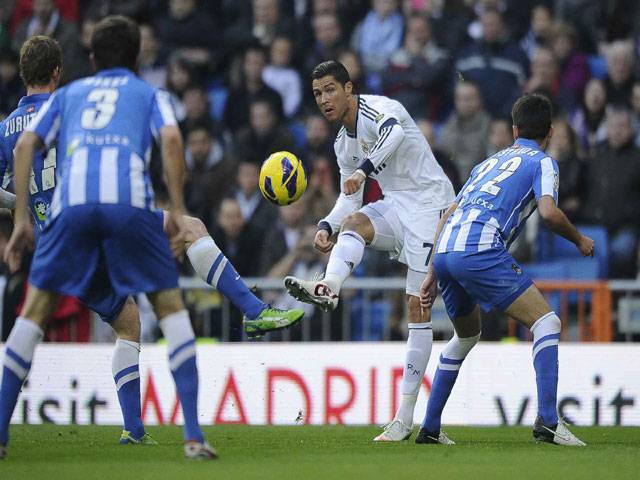 Ronaldo rescues Madrid, Barca cruise to victory
