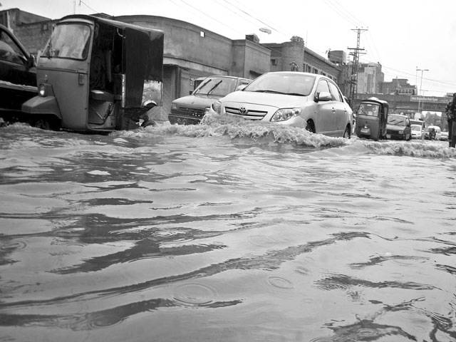 Rainwater inundates Peshawar slum areas