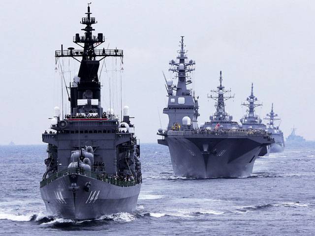 Japan steps up threat on China ship