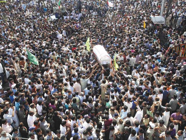 Karachi begins burials amid sobs, unrest