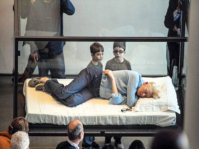 Oscar-winner Tilda Swinton sleeps in glass box at museum 