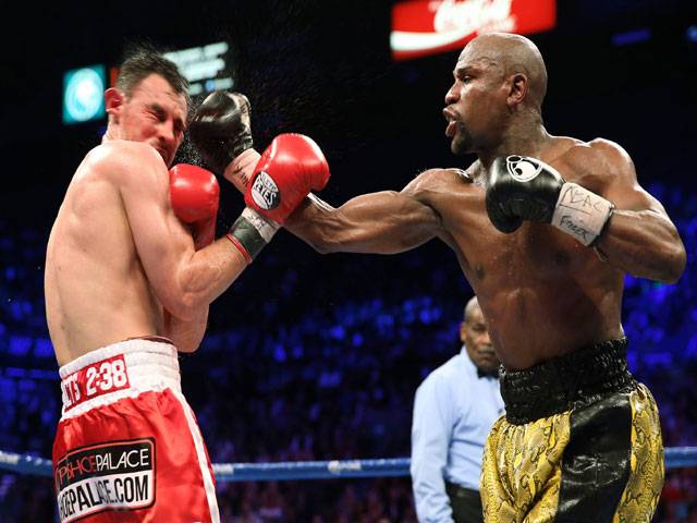 Mayweather batters Guerrero to keep WBC title