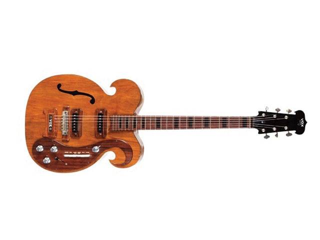 Lennon guitar sells for $408,000 