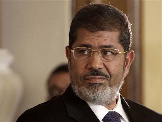Egypt's Mursi severs relations with Syria