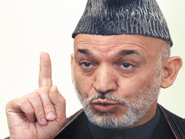 Karzai approves new election law