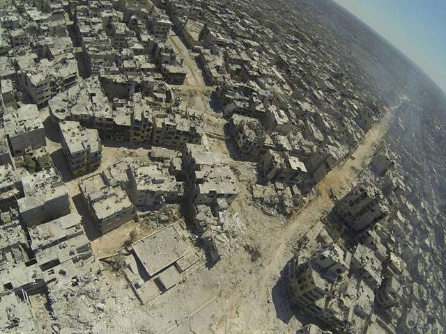 Syria army retakes key Homs rebel district