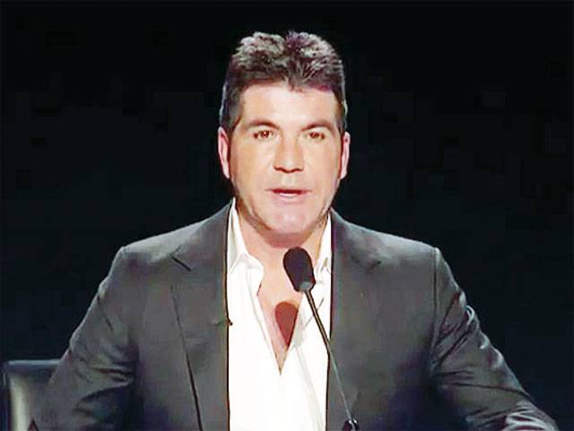 Simon Cowell sings on US X Factor
