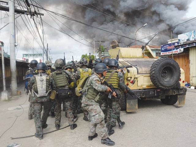Fighting spreads as rebels besiege Philippine city