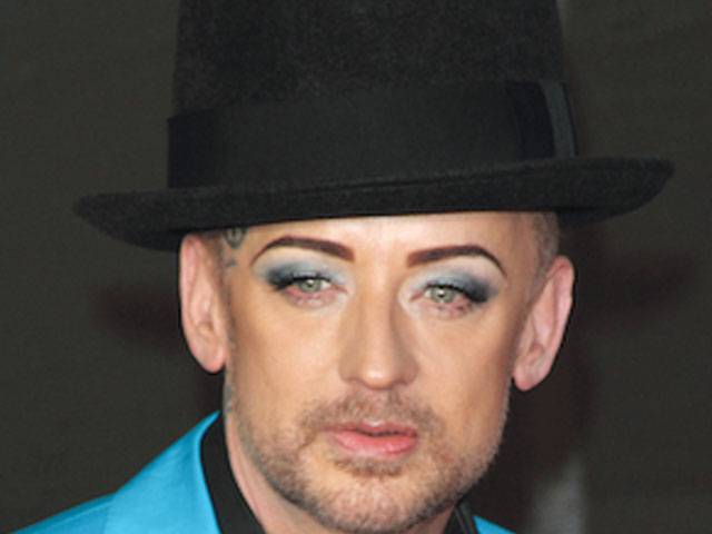 Boy George Rude to fans at gig