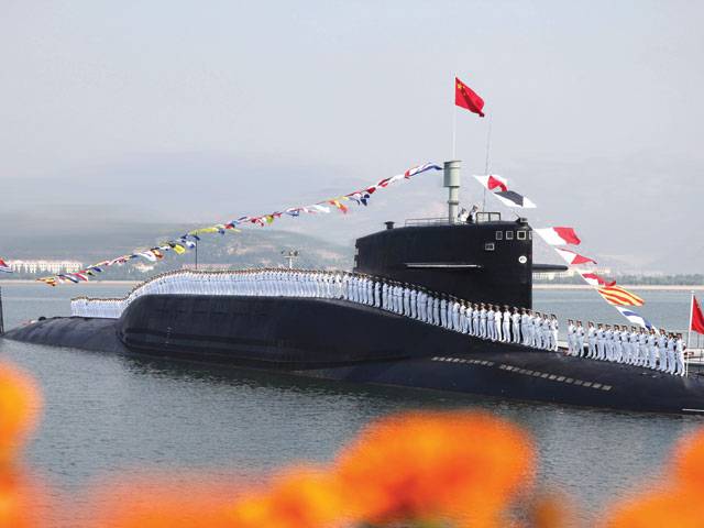 China flexes muscles with show of submarine force