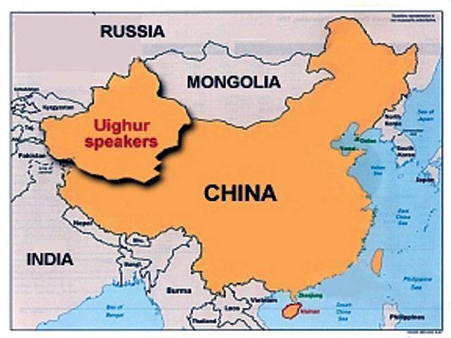 China pressures Uighur families on burqas, beards